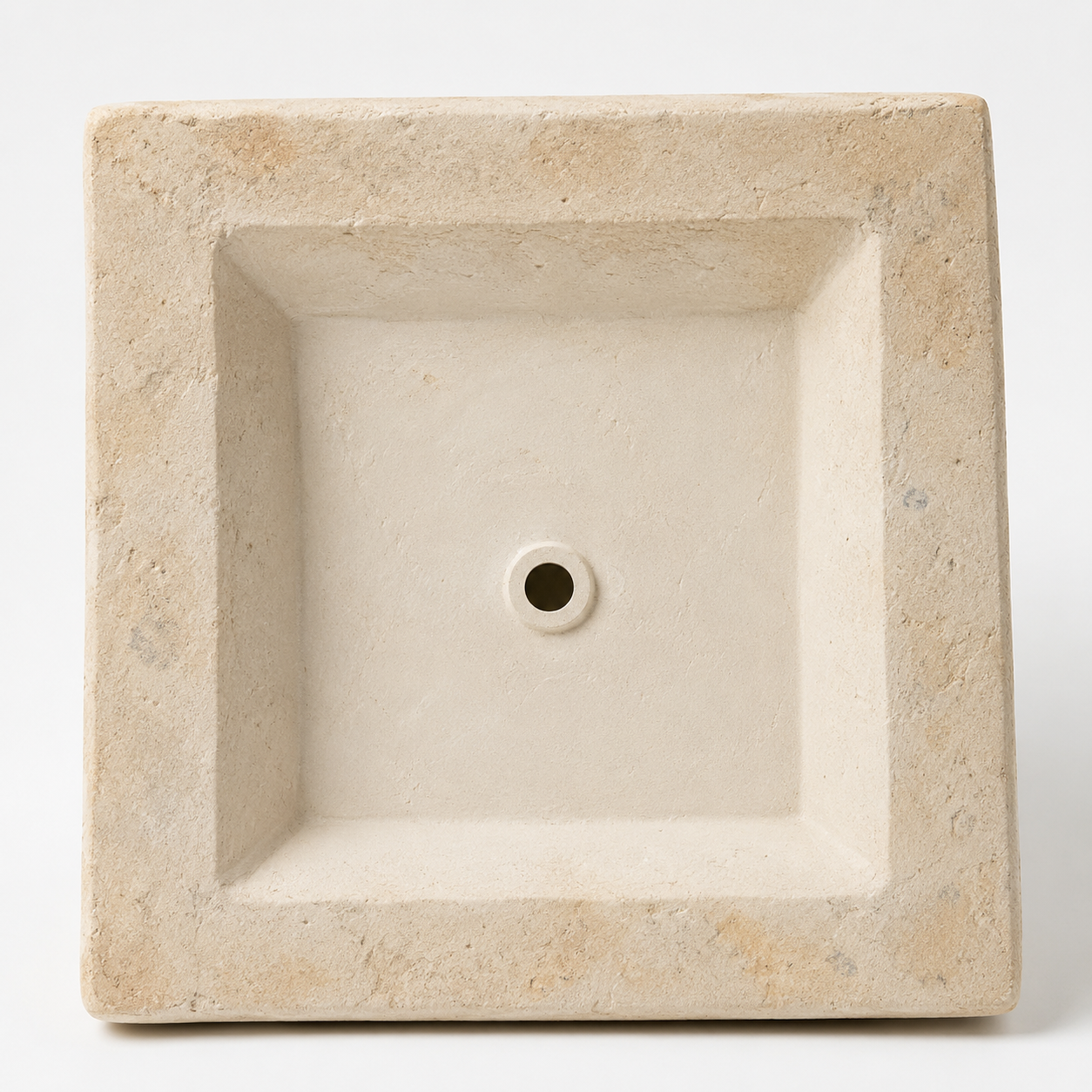 Heritage Roman Urn Planter styled with greenery in a garden setting