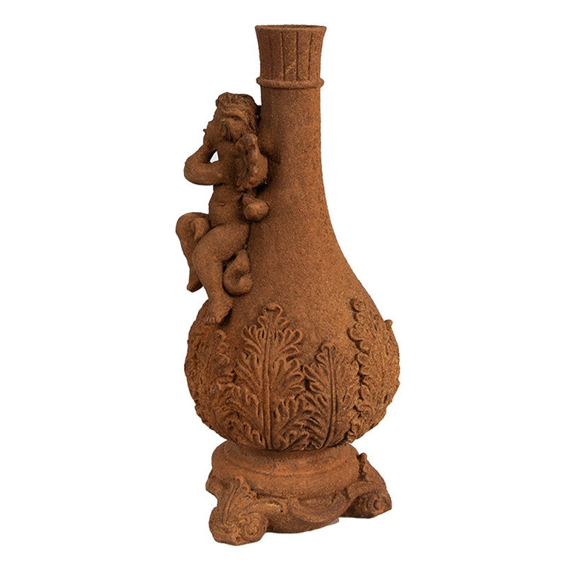 Side view of antique brown Angel candle holder showing sculpted detail